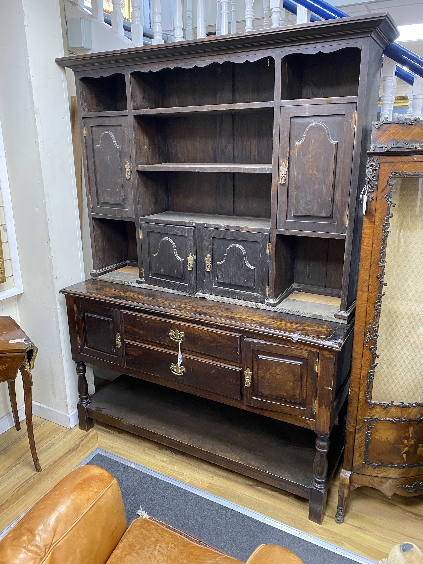 A George III style oak dresser with associated rack top, length 156cm, depth 54cm, height 211cm